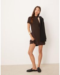 Mango - Knitted High Neck Short Sleeve Mini Dress - Lyst