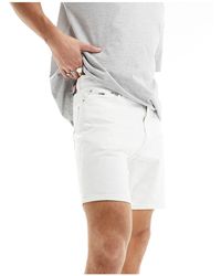 Tommy Hilfiger - Pantalones cortos dad con lavado blanco - Lyst