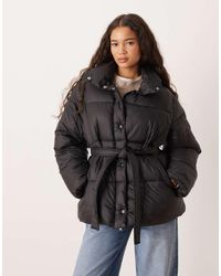 Gina Tricot - Belted Puffer Jacket - Lyst