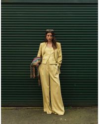 TOPSHOP - Pantaloni Sartoriali Premium Da Cerimonia A Fondo Ampio Color Latticello A Pieghe - Lyst