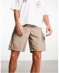 New Look - Pantalones cortos marrones con bolsillo - Lyst