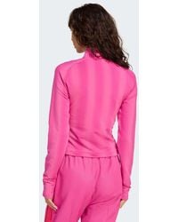 adidas Originals - Top A Maniche Lunghe Fucsia Semilucido Con Zip Corta E Grafica Stile Calcio - Lyst