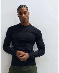 4505 - Seamless Physique Defining Muscle Fit Compression Base Layer Long Sleeve Top - Lyst