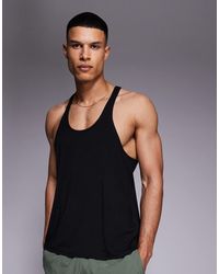 4505 - Icon Performance Jersey Quick Dry Stringer Singlet - Lyst