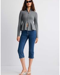 Stradivarius - Strickpullover mit schößchen - Lyst