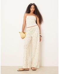ASOS - Pantalones Amarillo Limón De Pernera Ancha Con Estampado De Florecitas De Tejido Gofrado De (Parte De Un Conjunto) - Lyst