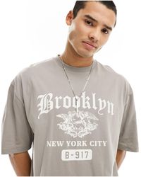 ASOS - T-shirt oversize avec imprimé brooklyn sur le devant - beige - Lyst