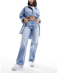 Bershka - Jeans a fondo ampio e vita alta anni '90 lavaggio chiaro - Lyst