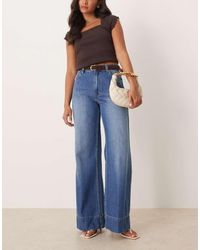 ASOS - Vaqueros De Pernera Ancha Con Lavado Medio Oscuro, Cinturón Y Pliegue Delantero De -Azul - Lyst