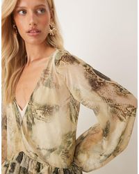 asos edition bird embellished smock midi dress ASOS EDITION organza smock midi dress with floral embroidery in pink