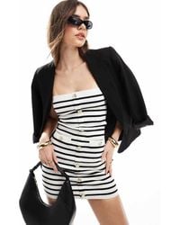 4th & Reckless - Gestreepte Gebreide Mini Bandeau-Jurk Met Gouden Knopen - Lyst