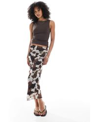 New Look - Jupe mi-longue en tulle avec imprimé vache - Lyst
