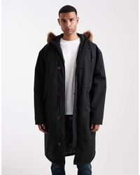 ASOS - Oversized Gewatteerd Jack Met Capuchon Met Imitatiebont - Lyst