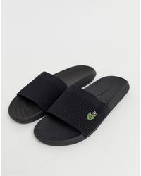 claquettes homme lacoste