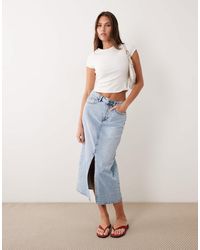 Vila - Jupe mi-longue fendue devant en jean à taille haute - clair - Lyst