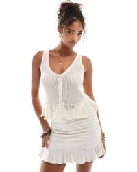 Stradivarius - Ruffle Hem Knitted Top - Lyst