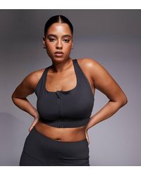 4505 - Curve Icon Active High Support Sports Bra With Removable Padding And Adjustable Straps - Lyst