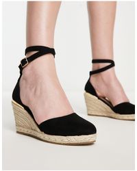Truffle Collection - Espadrilles a zeppa nere - Lyst