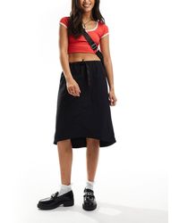 Gramicci - – verstaubarer midirock aus nylon - Lyst
