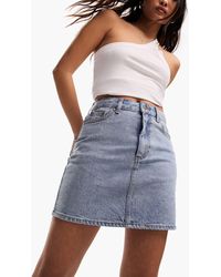 ASOS - Asos design petite - mini-jupe en jean à taille haute - moyen délavé - Lyst