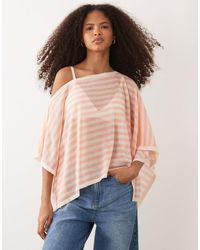 ASOS - Poncho rayé en maille fine transparente - pêche - Lyst