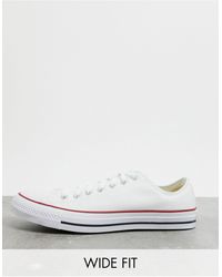 Converse Chuck Taylor All Star - Hoge Sneakers Met Brede Pasvorm in het  Zwart | Lyst NL