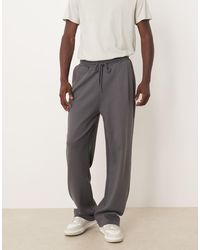 ASOS - Joggingbroek Met Wijde Pijpen En Plooien - Lyst