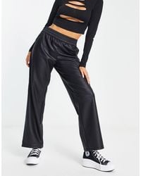 ONLY - Pantalones Negros De Pernera Recta Con Cinturilla Elástica De Cuero Sintético De - Lyst