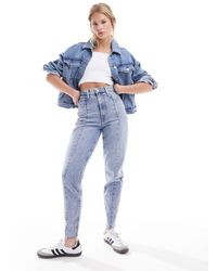 Levi's - Vaqueros Mom Azules Con Lavado Claro De Talle Alto De - Lyst