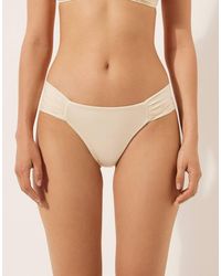 Calzedonia - Shiny Satin Ruched Bikini Bottoms - Lyst