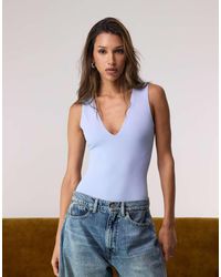 GOOD AMERICAN - Sculpting Deep V Tank Bodysuit - Lyst