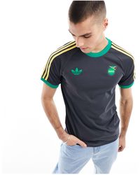 adidas Originals - Adidas football - jamaica og - t-shirt nera con 3 strisce - Lyst