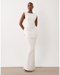 Wanderdoll - Eman Sleeveless Slash Neck Draped Waist Detail Bodycon Satin Maxi Dress - Lyst