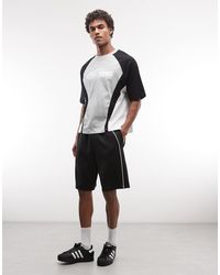ASOS - Short oversize en jersey imitation néoprène à liserés - Lyst