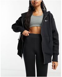 Nike - Felpa con cappuccio oversize nera e bianca con logo piccolo e zip - Lyst