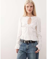 Monki - Keyhole Long Sleeve Top With Peplum Detail - Lyst