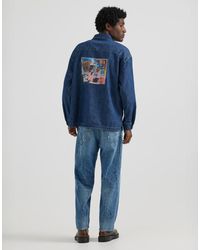 Lee Jeans - X jean-michel basquiat - capsule - chemise en jean à enfiler style workwear avec imprimé artistique au dos - délavage moyen - Lyst