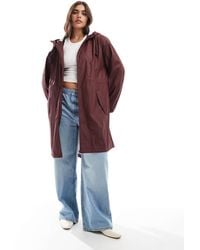 ASOS - Asos Design Curve Contrast Detail Rubberised Rain Parka - Lyst