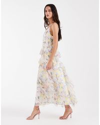 Vero Moda - Smilla - robe mi-longue en mousseline imprimé fleuri avec bretelles fines et détail volanté - rose/jaune - Lyst