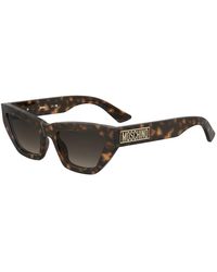 Moschino - Moschino Zonnebril Opvallende Cat Eye Zonnebril Met Getinte Glazen - Lyst