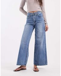 Levi's - Vaqueros Elásticos De Talle Alto Y Pernera Ancha 728 De - Lyst