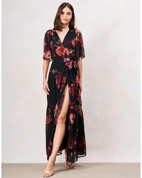 Hope & Ivy - The Anne-Marie Flutter Sleeve Maxi Wrap Dress With Tie Waist - Lyst