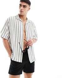 ASOS - Camicia oversize nera e bianca a righe con rever - Lyst