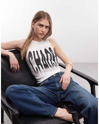 ASOS - Canotta Bianca A Coste Con Scollo Rotondo E Grafica Chaos - Lyst