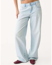 Stradivarius - – d91 – jeans aus em denim mit weitem bein und niedrigem bund - Lyst