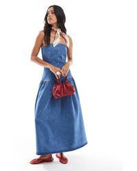ASOS - Robe mi-longue bandeau en jean avec taille basse cintrée - moyen - Lyst