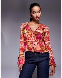 River Island - Top A Maniche Lunghe Trasparente Arancione E Rosso A Fiori - Lyst