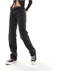 Monki - – monokomi – gerade geschnittene jeans mit mittlerer taille - Lyst