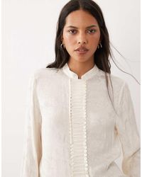 Mango - High Neck Jacquard Long Sleeve Blouse With Button Detailing - Lyst