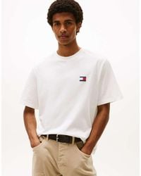 Tommy Hilfiger - T-Shirt Oversize Bianca Con Stampa Del Logo Sul Retro - Lyst